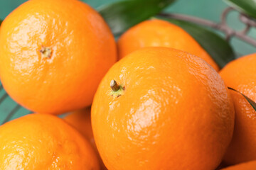 Basket with sweet tangerines on color background, closeup