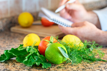 Fresh vegetables and fruits on the kitchen countertop. Diet healthy food. Healthy lifestyle concept