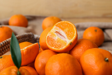 Sweet tangerines on wooden background, closeup
