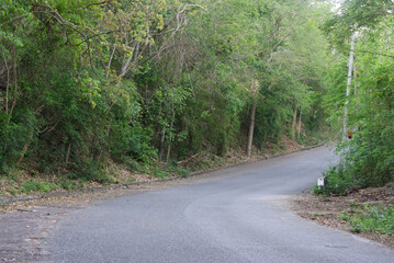 Asphalt road up a mountain slope