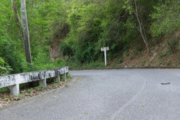 Asphalt road up a mountain slope