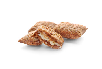 Tasty corn pillows on white background