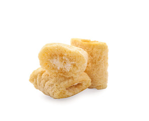 Tasty corn pillows on white background