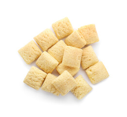 Tasty corn pillows on white background