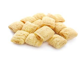 Tasty corn pillows on white background