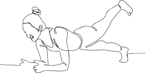 Fit woman doing yoga plank