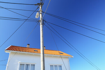 power lines and house