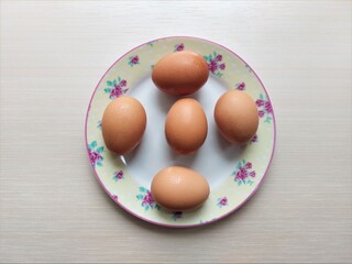 Eggs on a colorful plate. Easter eggs background