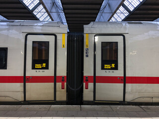 High speed ICE Inter City Express  train at Munich main station with detail view of doors of two waggons