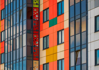 Colorful facade of a modern apartment building.Part of the city's real estate.
