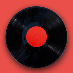 Gramophone vinyl record isolated at the  orange background with clipping path
