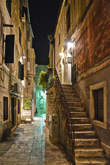 Fototapeta na wymiar A narrow street in the historic center of Split, an ancient city in Croatia.