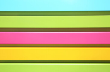 Colorful horizontal wooden plank.Bright multicolored background. Wooden backdrop.