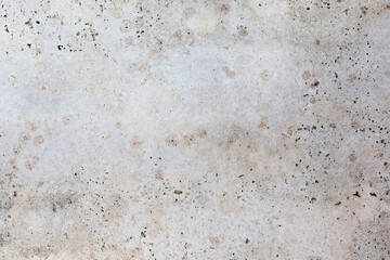 Light blue wall with abstract spots. Beautiful gray, white texture, abstract wall surface background, vintage surface texture with copy space, unusual mottled surface