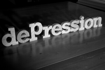 Depression, text words typography written with wooden letter on black background, life and business negativity