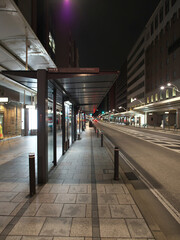 Kyoto,Japan-April 5, 2021: Midnight scene of Shijo Takakura bus stop, the main shopping district in Kyoto, Japan
