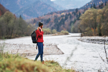 woman travel tourism mountains landscape lake river autumn