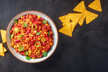 Chilli con carne, colorful stew with meat and vegetables