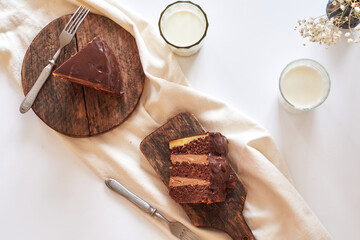 Chocolate cake on white background. Top view
