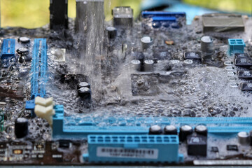 Clean the computer motherboard with water and detergent.
