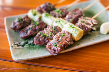 Japanese Beef grill or yakitori serve in izakaya style restourant set on Japanese style
