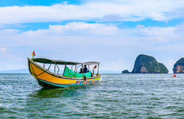 Fototapeta na wymiar Local boat and cloud sky in a Phang-nga bay Thailand view from boat
