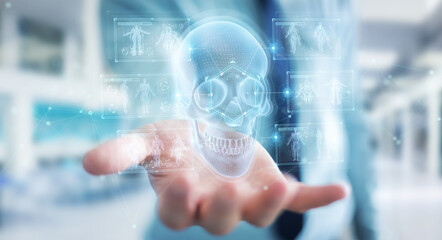 Fototapeta na wymiar Man using digital x-ray skull holographic scan projection 3D rendering