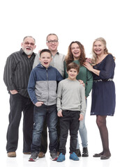 Fototapeta premium in full growth. happy family standing together.