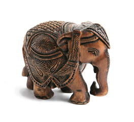 Wooden carved elephant isolated on white background. An Indian souvenir. Handmade work.
