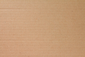 Cardboard sheet texture background, detail of recycle brown paper box pattern.