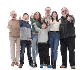Obraz premium in full growth. friendly family showing thumbs up .