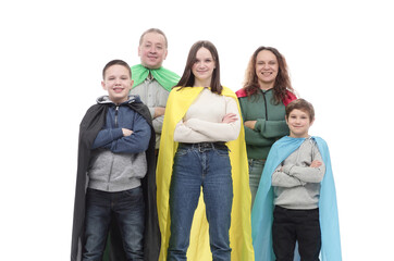 in full growth. happy family in superhero raincoats.