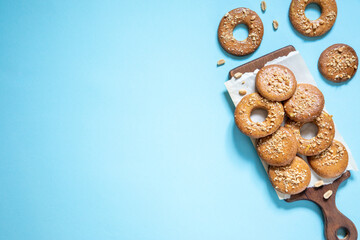 homemade shortbread cookies with peanuts on a trendy blue background. peanut cookie. flat lay, place for text, food background