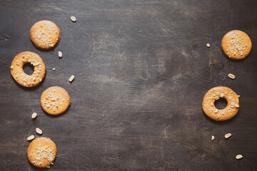 homemade shortbread cookies with peanuts on a wooden background. peanut cookie. flat lay, place for text, food background