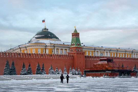 View of Red Square on a frosty winter morning. Lenin's Mausoleum building (The inscription is Lenin), the Kremlin tena and tower, and the Senate building in the Kremlin.