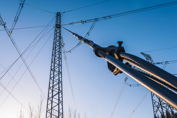 Electricity network from forsmark nuclear power plant during sunset in the Swedish countryside...
