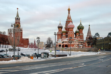 View of Vasilievsky Spusk, Red Square, St. Basil's Cathedral and the Spasskaya Tower of the Moscow Kremlin on a frosty winter morning
