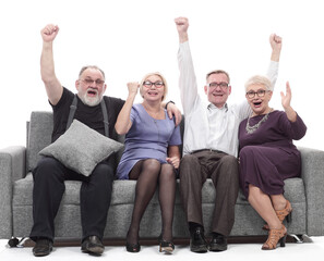 happy family sitting on a large comfortable sofa.