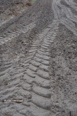 Tractor tire tracks on a plowed field