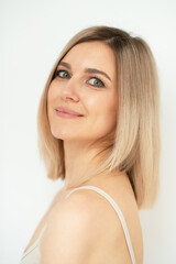 Beautiful calm middle aged woman, natural light. Anti-aging and beauty treatment.