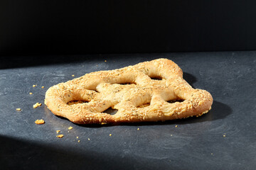 food, baking and cooking concept - close up of cheese bread on kitchen table