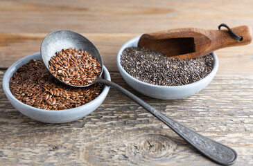 Healthy super foods Chia and flax seeds in a bowl ready to eat. These seed are very healthy and can be eaten with a variety of different dishes.