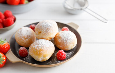 Homemade fritters stuffed with strawberry and raspberry jam.