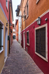 Among the colorful alleys of Caorle city