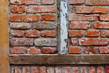 Brick wall and wooden beams.