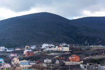 Panoramic view of small village Myskhako located on the Black Sea coast near Koldun mountain.