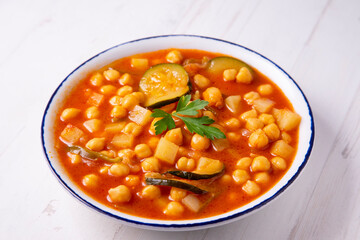 Chickpeas stewed with vegetables and zucchini