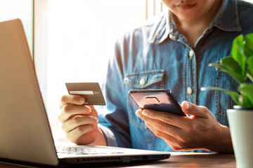 businessmen use their credit cards through mobile internet banking apps to shop online and digital payment ideas.