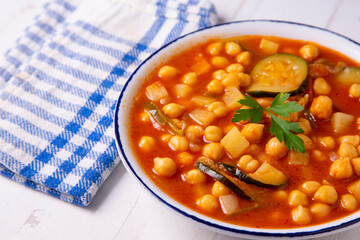 Chickpeas stewed with vegetables and zucchini
