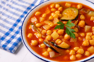 Chickpeas stewed with vegetables and zucchini